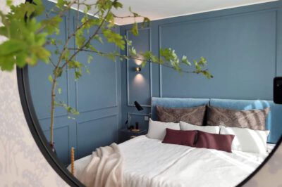 Wall moldings in a blue bedroom